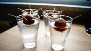 Avocado seeds on glass with water